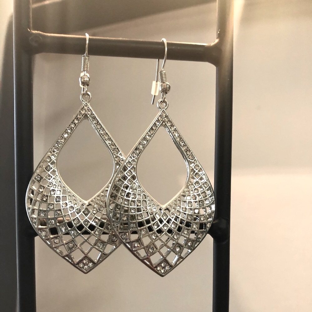 Beautiful silver with small rhinestones.